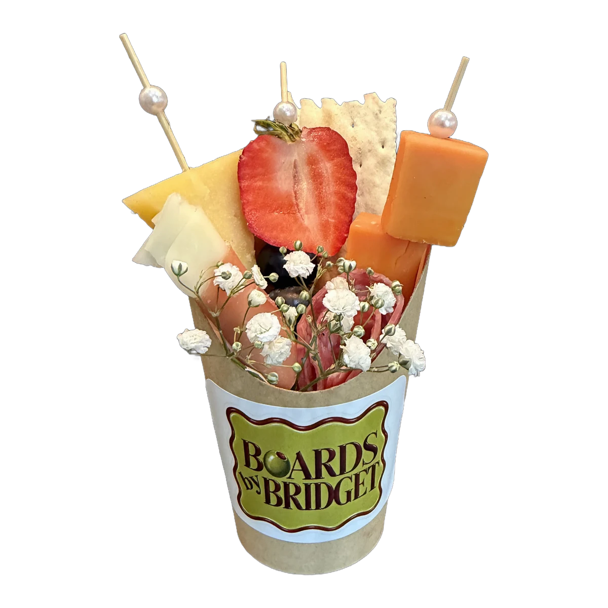 Handheld charcuterie: a kraft cup with the Boards by Bridget label, filled with cheeses, salami, prosciutto, a strawberry, blueberries, crackers and baby's breath